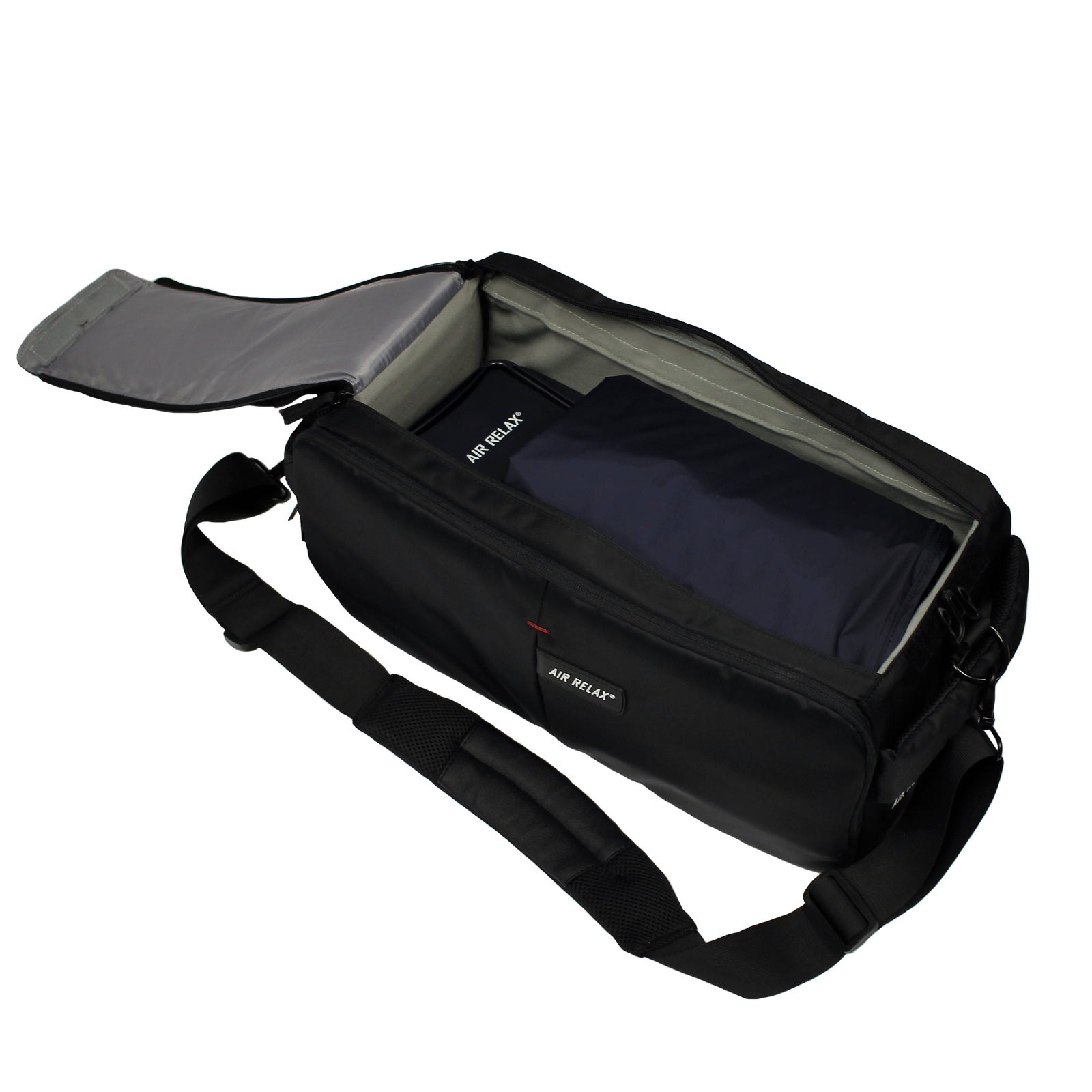 CARRYING CASE - AIR RELAX SYSTEM — Unzipped carrying case showing packed leg sleeves